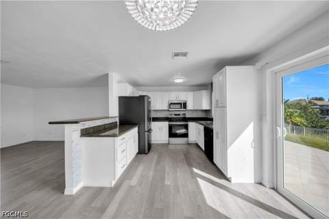1206 NE 4th Ter, Cape Coral FL - photo 8 of 48