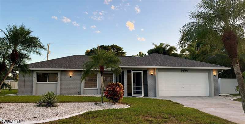 bedroom SingleFamilyResidence at 1430 SE 27th Ter, Cape Coral, Cape Coral — photo 1