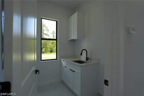 231 Wanatah Ave, Lehigh Acres FL - photo 12 of 35