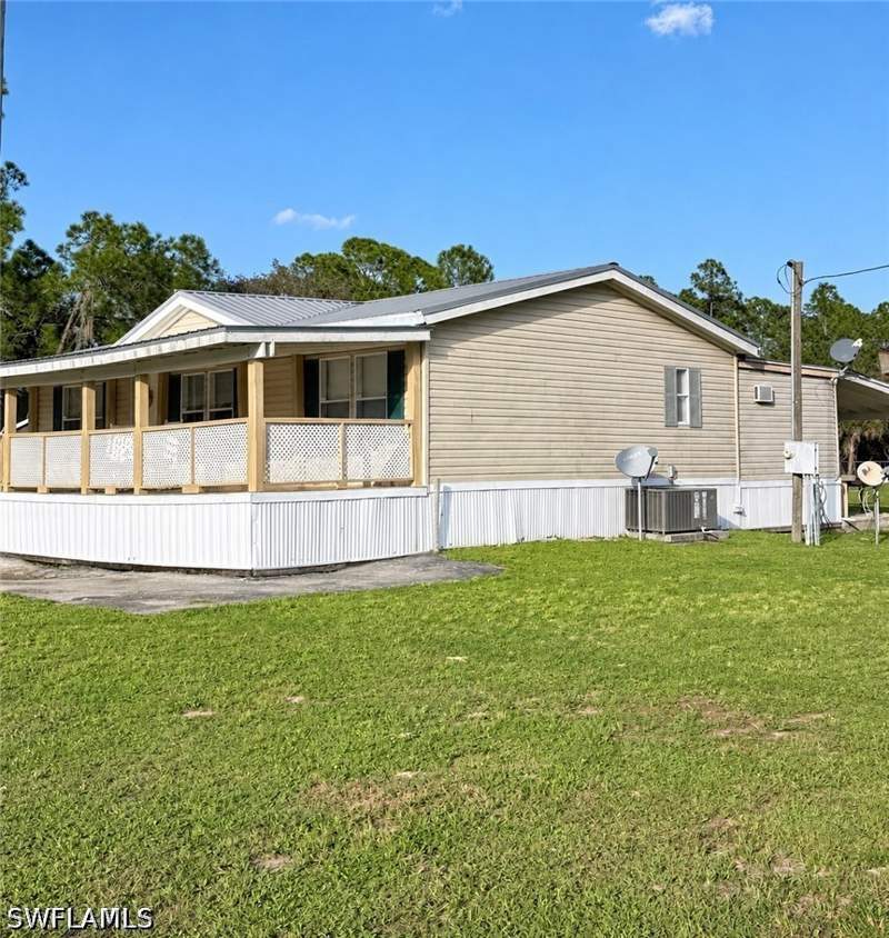 3 bedroom ManufacturedHome at 555 S Hacienda St, Montura, Clewiston — photo 2