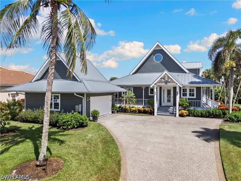 5 bedroom SingleFamilyResidence at 411 N Barfield Dr, Marco Island, Marco Island — photo 1