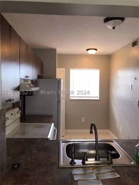 459 NE 210th Cir Ter 201-17, Miami FL - photo 21 of 33