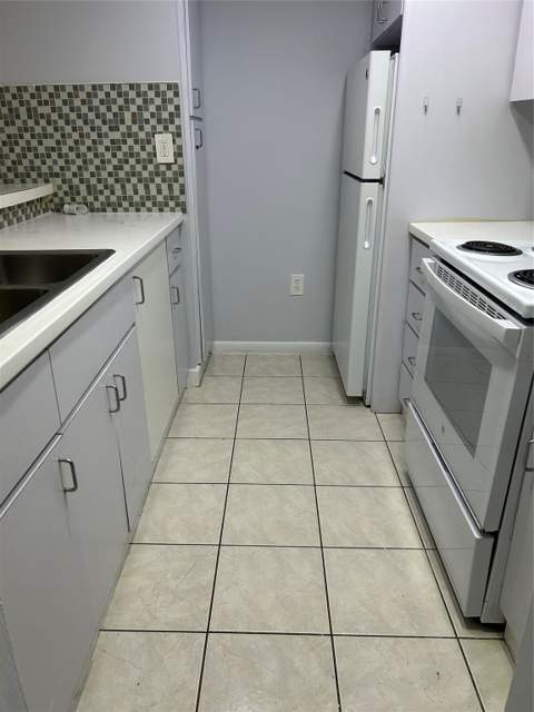 7035 NW 186th Street D-111, Hialeah FL - photo 7 of 16