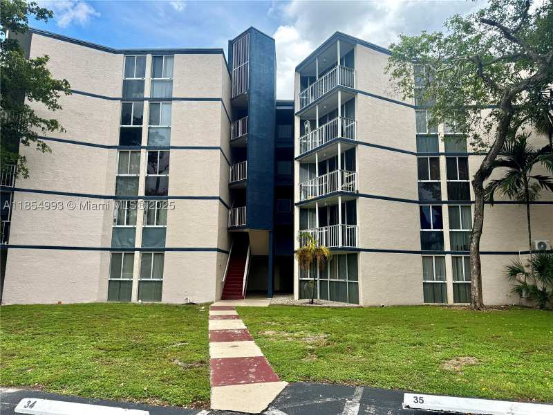 2 bedroom Condominium at 7165 NW 186th St A211, Las Brisas@ Country Club, Hialeah — photo 1