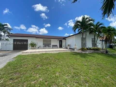 4 bedroom SingleFamilyResidence at 25931 SW 130th Ave, Meadow Wood Manor #4, Homestead — photo 1