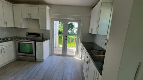 560 NW 53rd St, Miami FL - photo 8 of 12