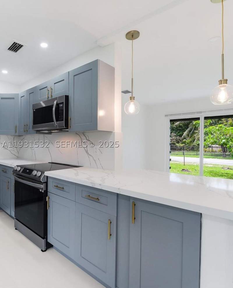 4 bedroom SingleFamilyResidence at 851 NW 146th St, BISCAYNE GARDENS SEC F PA, Miami — photo 2