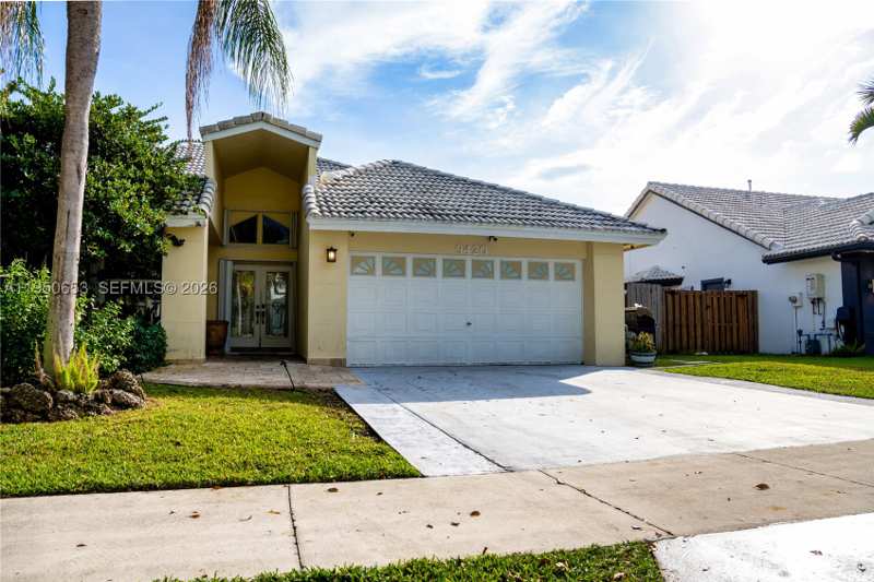 5 bedroom SingleFamilyResidence at 9420 SW 212th Terrace, Lakes By The Bay Sec 7, Cutler Bay — photo 1