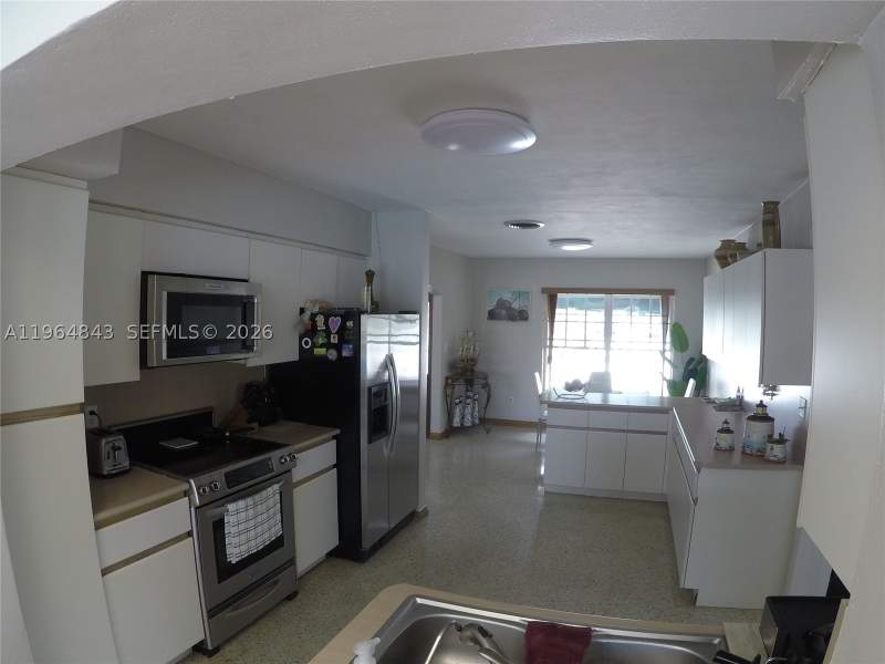 4 bedroom SingleFamilyResidence at 12945 Cherry Rd, VENETIAN SEC KEYSTONE POI, North Miami — photo 5