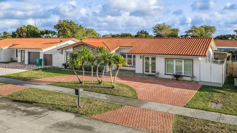 4 bedroom SingleFamilyResidence at 13170 SW 20th St, Tamiami Lakes Sec 1, Miami — photo 1