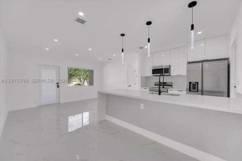 3 bedroom SingleFamilyResidence at 910 NW 133rd St, De Pauly Heights, North Miami — photo 3