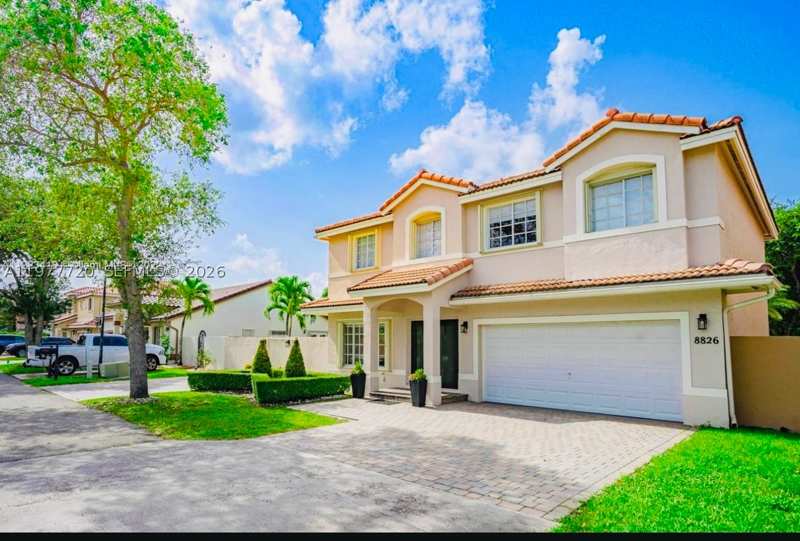 4 bedroom SingleFamilyResidence at 8826 NW 189th Ter, Lakes On The Green Gwendo, Hialeah — photo 1