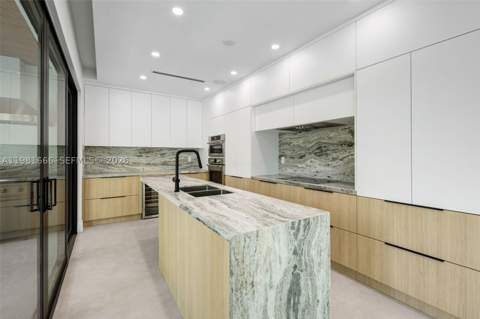 569 NW 44th St, Miami FL - photo 10 of 39