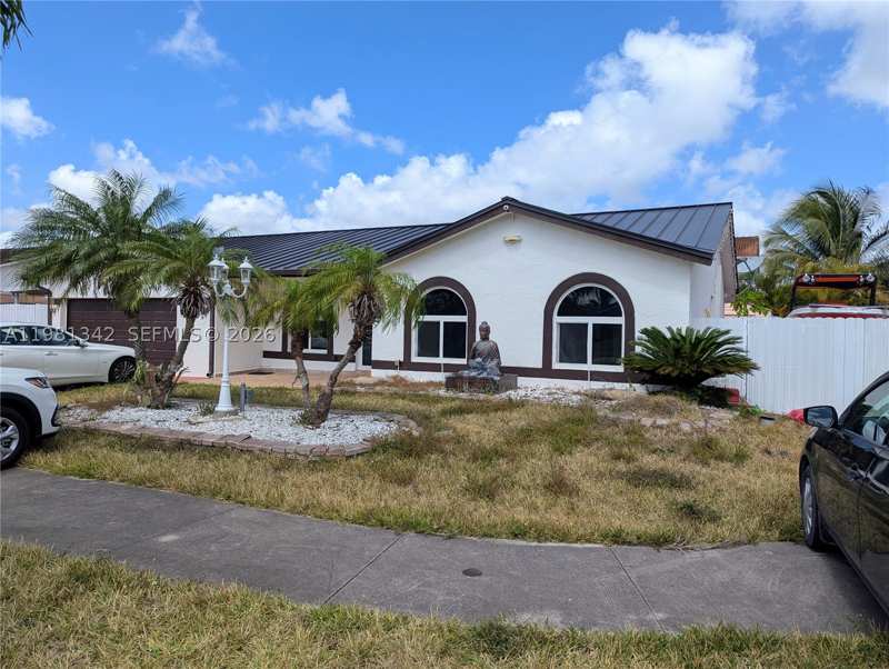 4 bedroom SingleFamilyResidence at 13925 SW 158th Ter, Mediterrania, Miami — photo 1