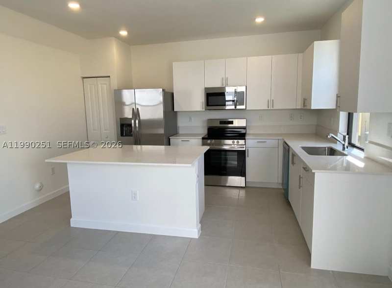 5 bedroom Townhouse at 23074 SW 128th Pl, Siena Reserve, Goulds — photo 1