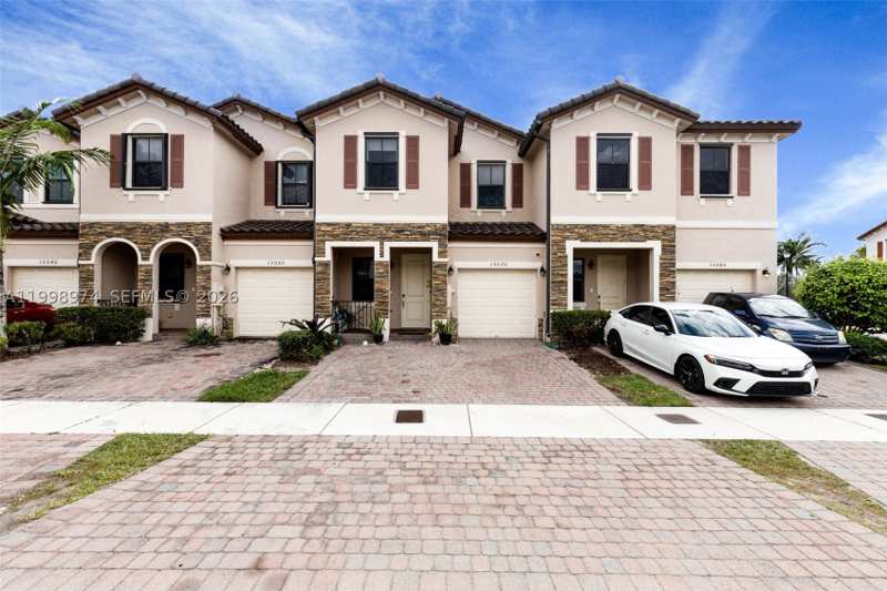 4 bedroom Townhouse at 15070 SW 119th Ln, Garden Estates At The Ham, Miami — photo 1