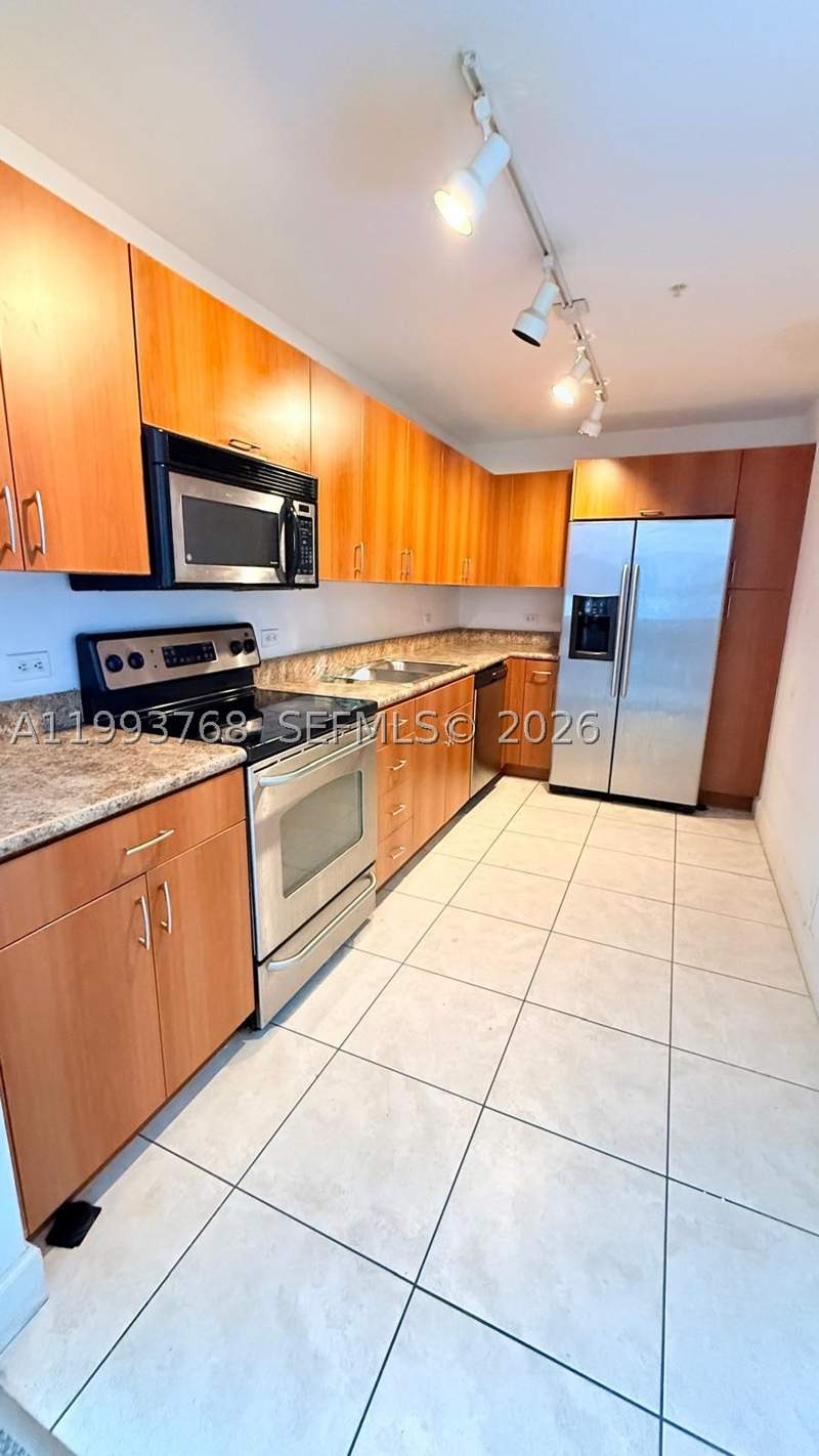 1 bedroom Condominium at 7501 E Treasure Dr 8B, Treasures On The Bay II C, North Bay Village — photo 2
