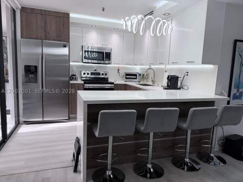 671 NE 195th St 208E, Miami FL - photo 6 of 39