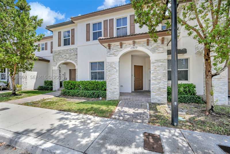3 bedroom Townhouse at 12429 NW 23rd Ct, Golf Park Sec 1, Miami — photo 1