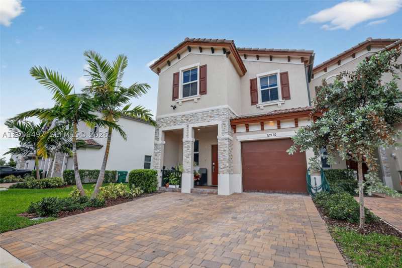 4 bedroom Townhouse at 12936 NW 22nd Pl, Golf Park Sec 1, Miami — photo 1