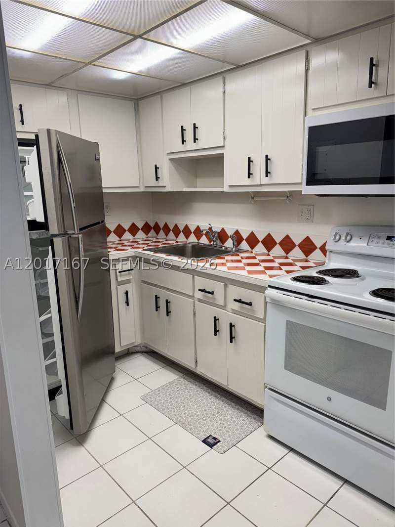 0 bedroom Condominium at 1470 NE 125th Ter 205, Three Horizons North Cond, North Miami — photo 4