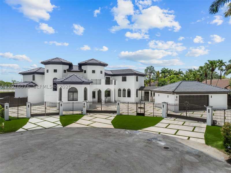 6 bedroom SingleFamilyResidence at 9881 SW 148th Ter, Arenal Sub, Miami — photo 1