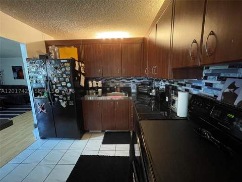 671 NE 195th St 207-E, Miami FL - photo 10 of 43