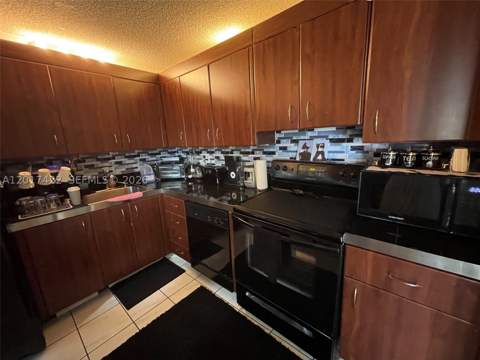 671 NE 195th St 207-E, Miami FL - photo 12 of 43
