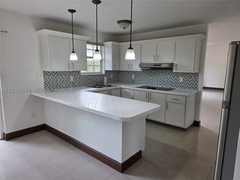 4 bedroom SingleFamilyResidence at 10120 SW 127th Ave, Calusa Club Estates 6th A, Miami — photo 4