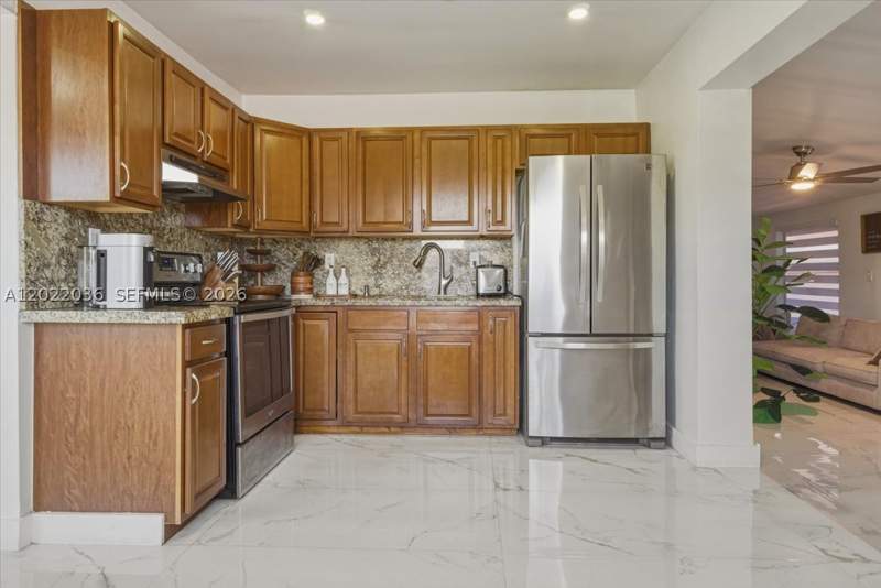 3 bedroom SingleFamilyResidence at 120 W 50th St, Ulelah, Hialeah — photo 2
