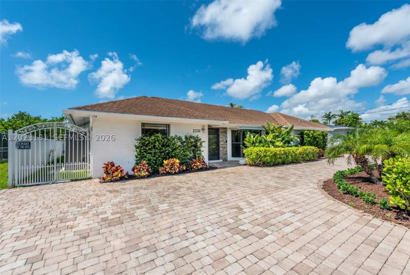 5 bedroom SingleFamilyResidence at 2330 NE 195th St, ENCHANTED LAKE SEC 6, Miami — photo 1