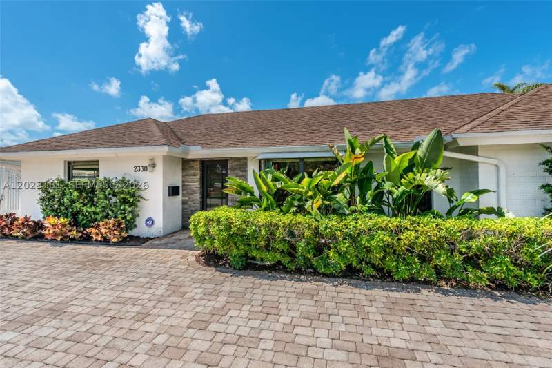 5 bedroom SingleFamilyResidence at 2330 NE 195th St, ENCHANTED LAKE SEC 6, Miami — photo 2