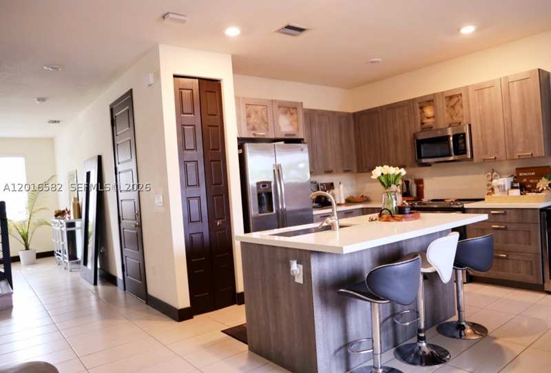 4 bedroom Townhouse at 16012 NW 91st Ct, Dunnwoody Lake, Miami Lakes — photo 1