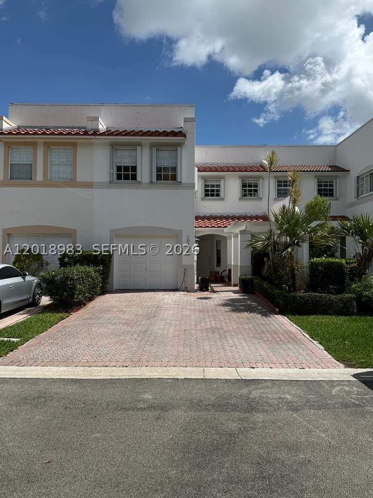 3 bedroom Townhouse at 10973 NW 62nd Ter, Doral Isles Antigua, Doral — photo 1