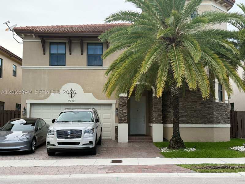 5 bedroom SingleFamilyResidence at 9907 NW 87th Ter, Doral Breeze, Doral — photo 1