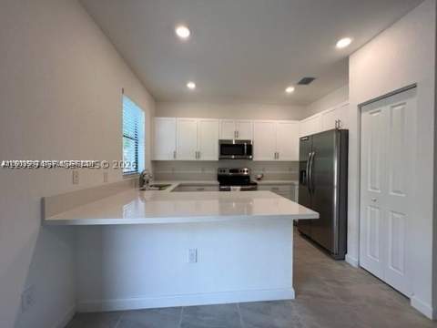 327 NE 208th Ter, Miami FL - photo 6 of 28