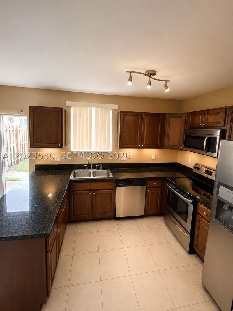 3 bedroom Townhouse at 1827 NW 142nd Ln, Mirage At Sailboat Cove, Opa Locka — photo 2