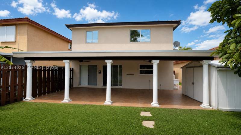 4 bedroom SingleFamilyResidence at 12211 SW 137th Ter, Four Lakes Sec 3, Miami — photo 2
