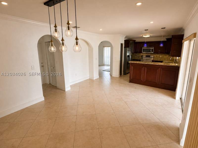 4 bedroom SingleFamilyResidence at 12211 SW 137th Ter, Four Lakes Sec 3, Miami — photo 5