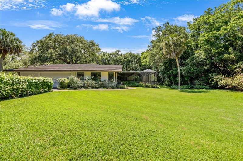 4 bedroom SingleFamilyResidence at 9979 Fairchild Way, Snapper Creek Lakes Sub, Coral Gables — photo 1