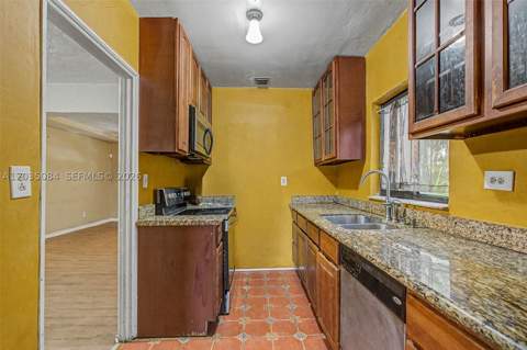 583 NW 47th St, Miami FL - photo 8 of 28