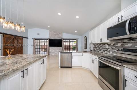 8724 NW 149th Ter, Miami Lakes FL - photo 15 of 35