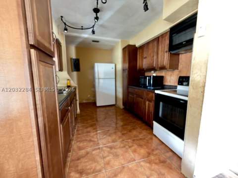 997 NW 116th St, Miami FL - photo 8 of 16