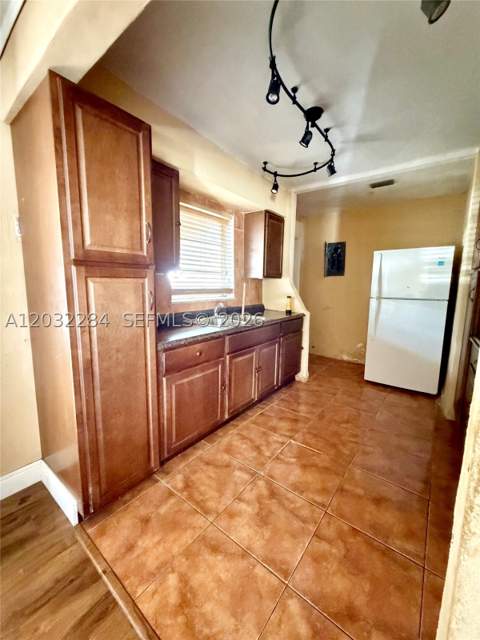 997 NW 116th St, Miami FL - photo 9 of 16