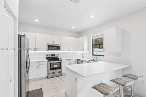 592 NW 203rd Ter, Miami Gardens FL - photo 10 of 37