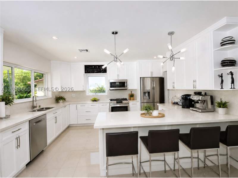 4 bedroom SingleFamilyResidence at 9710 SW 72nd Ct, Breezeswept Acres, Pinecrest — photo 3