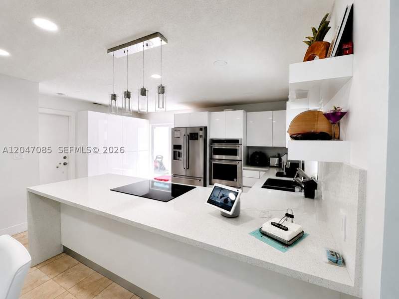 3 bedroom SingleFamilyResidence at 17324 NW 63rd Ave, The Moors Cluster Homes, Hialeah — photo 4