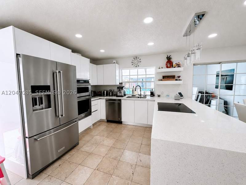 3 bedroom SingleFamilyResidence at 17324 NW 63rd Ave, The Moors Cluster Homes, Hialeah — photo 5