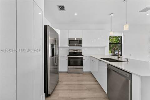 10908 W 32nd Ln, Hialeah FL - photo 7 of 39