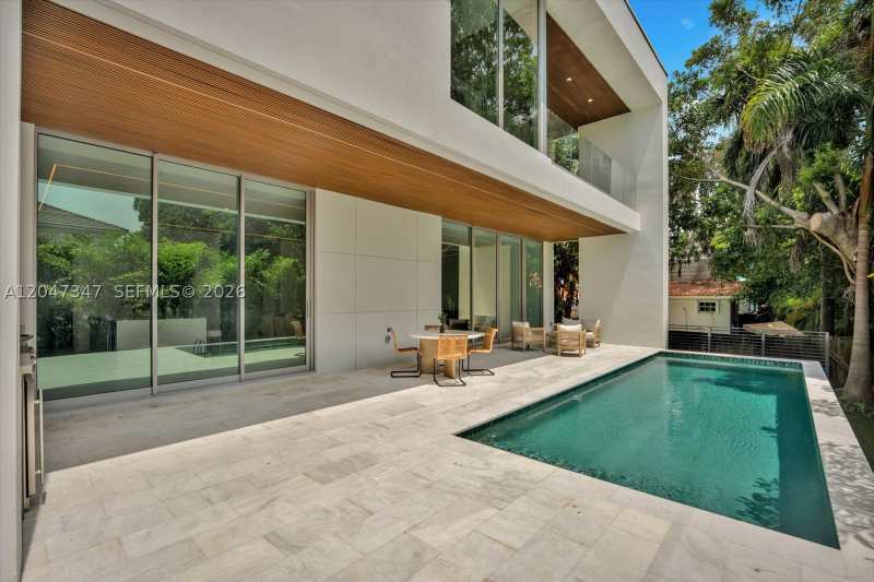 5 bedroom SingleFamilyResidence at 7701 Coquina Drive, North Bay Island, North Bay Village — photo 1